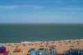 Tourists and locals enjoy Ramsgate main sands during period of warm dry summer weather in the South East