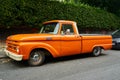 Ramsgate, United Kingdom - June 29, 2021: A mid sixties orange Ford F100 Pickup Truck Royalty Free Stock Photo