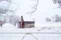 Ramshackle rustic shack in snowy rural scene