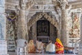 Ranakpur, India - February 2, 2017: people in the majestic jainist temple at Ranakpur, Rajasthan, India. Architectural details of