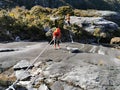 Ranau, Sabah Malaysia-31th March 2021. Unidentified climbers was holding the safety ropes while descending from the mountain. Royalty Free Stock Photo