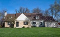 Ranch House with Stone Front in Spring Royalty Free Stock Photo