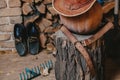 Pumpkin, tool and firewood on veranda Royalty Free Stock Photo