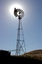 Ranch Windmill, Sun Behind Royalty Free Stock Photo