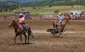 Ranchers competing at a rodeo in colorado
