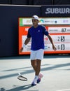 rancisco Cerundolo of Argentina in action during round of 32 match against Felix Auger Aliassime of Canada at 2023 Miami Open en