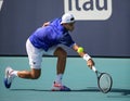 rancisco Cerundolo of Argentina in action during round of 32 match against Felix Auger Aliassime of Canada at 2023 Miami Open en