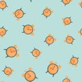 Random abstract seamless pattern with bright orange alarm clock elements. Pastel blue background Royalty Free Stock Photo