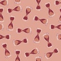 Random abstract seamless pattern with doodle hourglass elements print. Pink and maroon palette artwork