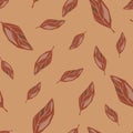 Random autumn seamless pattern with doodle brown leaf elements. Beige background Royalty Free Stock Photo