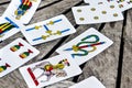 Random cards on wooden table Royalty Free Stock Photo