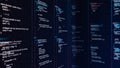 Random code in columns running on a computer screen, cypher or program source code scrolling on dark background Royalty Free Stock Photo