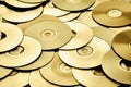 Abstract background of gold metallic DVD and CD optical storage disks Royalty Free Stock Photo