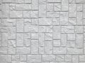 Random modern design square stone brick block pattern texture wall background.