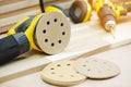 Random orbit sanders, sanding machine tool on Walnut Plywood in workshop, woodworking Handicraft and diy concept .selective focus Royalty Free Stock Photo