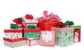 Random pile of bright colorful Christmas presents isolated on white Royalty Free Stock Photo