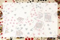 Random playing cards together forming a background