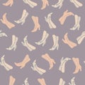 Random seamless abstract pattern with pink and purple pastel boots. Modern fashion artwork
