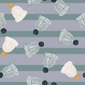 Random seamless christmas pattern with cartoon wool hat shapes. Blue and purple striped background