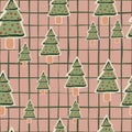 Random seamless doodle pattern with stylized winter cookies fir tree shapes. Green tasty ornament on pink chequered background