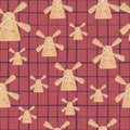 Random seamless pattern in building theme with windmill ornament. Chequered pale red background Royalty Free Stock Photo