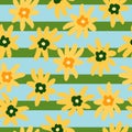 Random seamless pattern with yellow ditsy flowers print on reen and blue striped background