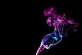 random shapes of colored smoke fired with colored flash blue, magenta and red