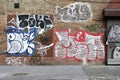 Random Painted Graffiti on Brick Wall Royalty Free Stock Photo