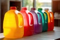 A range of liquid products, including detergents, bleaches and antiseptics, are presented in a variety of plastic bottles,