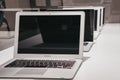 Range of MacBooks on display inside Apple Museum in Prague,Czech Republic Royalty Free Stock Photo