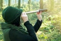 Ranger woman with spyglass in a forest Royalty Free Stock Photo