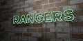 RANGERS - Glowing Neon Sign on stonework wall - 3D rendered royalty free stock illustration