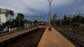 Rangkas Bitung, Indonesia - March 13 2021:An Indonesian man waiting a commuter train arrived at Rangkasbitung Station