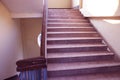 Rangpur,Bangladesh. February 18, 2020. Staircase with wood railing.Stairs in a modern College University building.Luxury custom Royalty Free Stock Photo