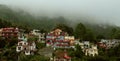 Low clouds on mountains, Mountain houses covered by fog and low clouds.