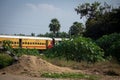 Ranipet, Tamil Nadu / India - January 04 2020: An Indian passenger train passing through a level crossing