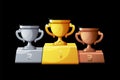 Ranked podium cups are silver, bronze and gold for the game. Royalty Free Stock Photo