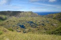 Rano Kau crater view with blue sky and ocean Royalty Free Stock Photo