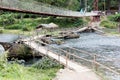 Instable old wooden bridge over a river, roadway for the local people on Ranomafana, Royalty Free Stock Photo