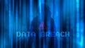 Ransomware concept. Abstract digital background with anonymous man of hacker in binary code and wording DATA BREACH with warning Royalty Free Stock Photo