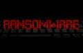 Ransomware pixellated text over keyboard illustration