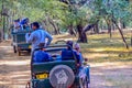 RANTHAMBORE National Park, INDIA-APRIL 15: Tourist group on Safari jeep crossing danger area of forest. Royalty Free Stock Photo