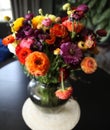 Ranunculus bouqet on black table Royalty Free Stock Photo