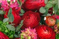 Ranunkulyus bouquet of red flowers on a white background