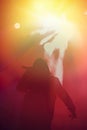 Rap singer on concert stage in bright lights Royalty Free Stock Photo