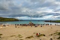 Rapa Nui historic boat arrives to Anakena beach, cloudy day