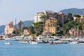 Historic seaside town of Rapallo facing the sea with port. Many boats moored in the marina.