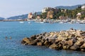 Historic seaside town of Rapallo facing the sea with port. Many boats moored in the marina.