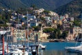 Panoramic view of the famous touristic city of Rapallo in northern Italy. Small town perched on a hill. Boats in the port Royalty Free Stock Photo