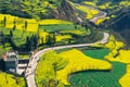 Rapeseed flowers at Snail farm Luositian Field in Luoping County, China Royalty Free Stock Photo